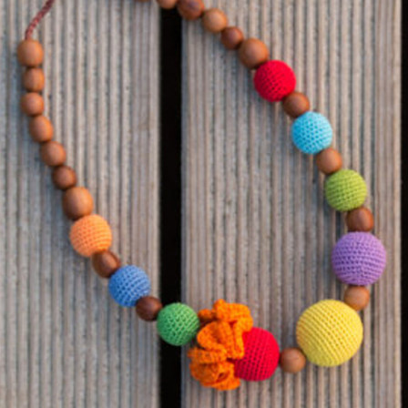 Collier portage et allaitement arc-en-ciel lumineux Kangaroocare