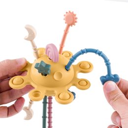 Petite&Mars Silicone sensory toy Crazy Planet 10+ - Intense Ochre