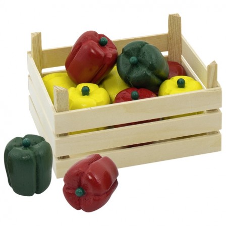 Crates of peppers in a wood Goki