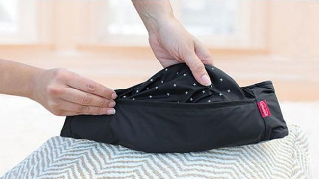 Le Zip travel plié dans sa pochette ceinture